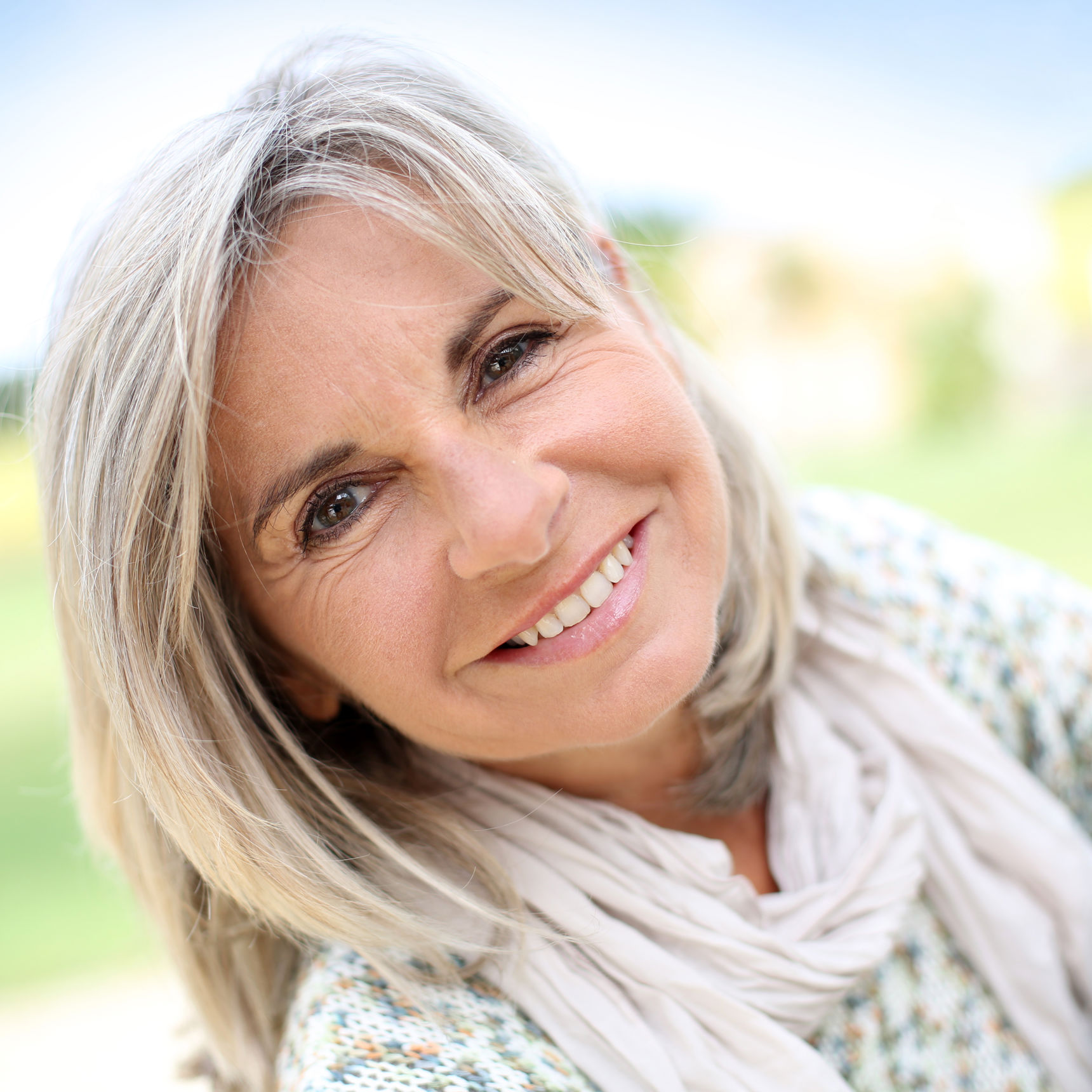 Foto af kvinde der smiler